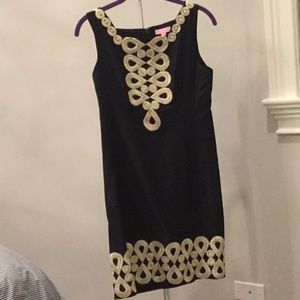 Black dress with gold embellishment